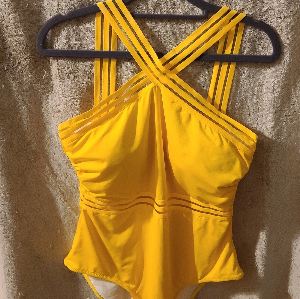 Bright yellow one piece Swimsuit. Only worn one time.